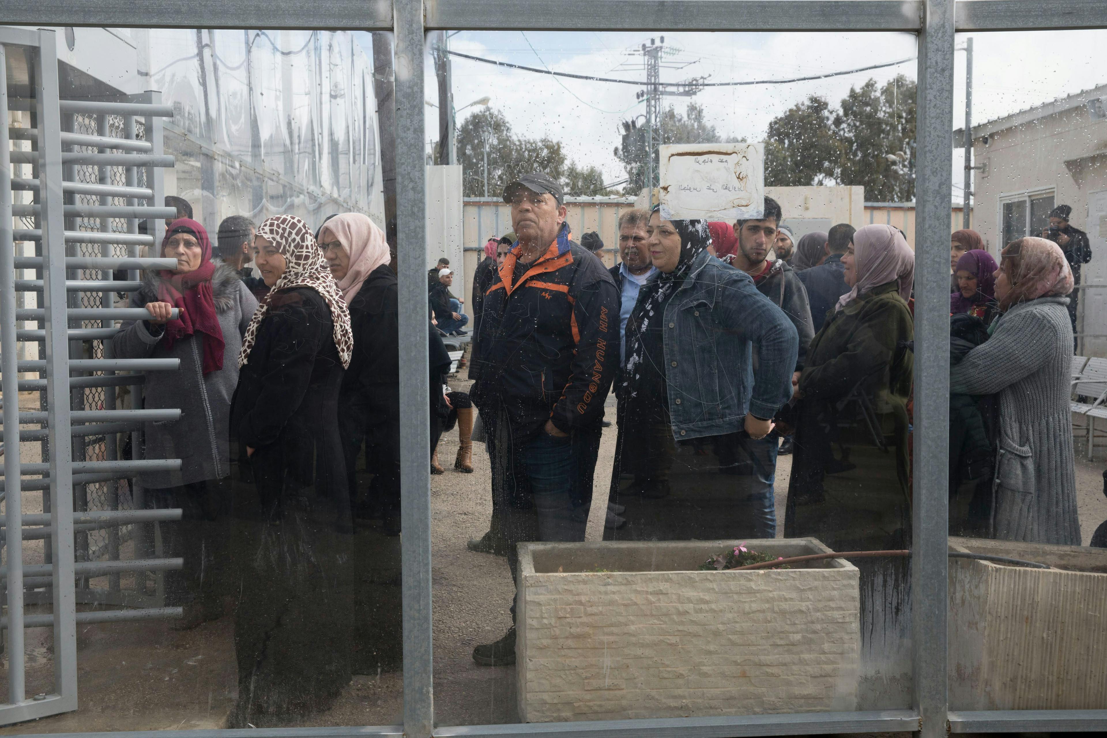 Detainees' families waiting to be let into the Ofer Military Court near Ramallah